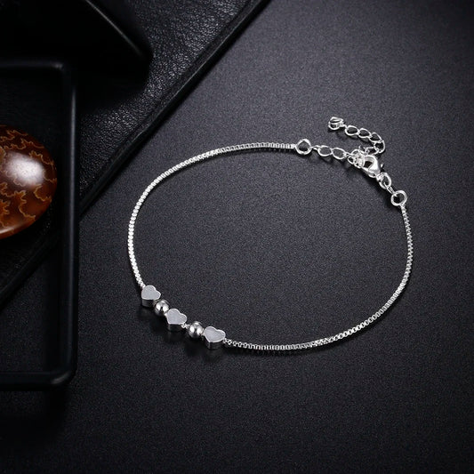 Armband med små berlocker hjärtan i äkta silver