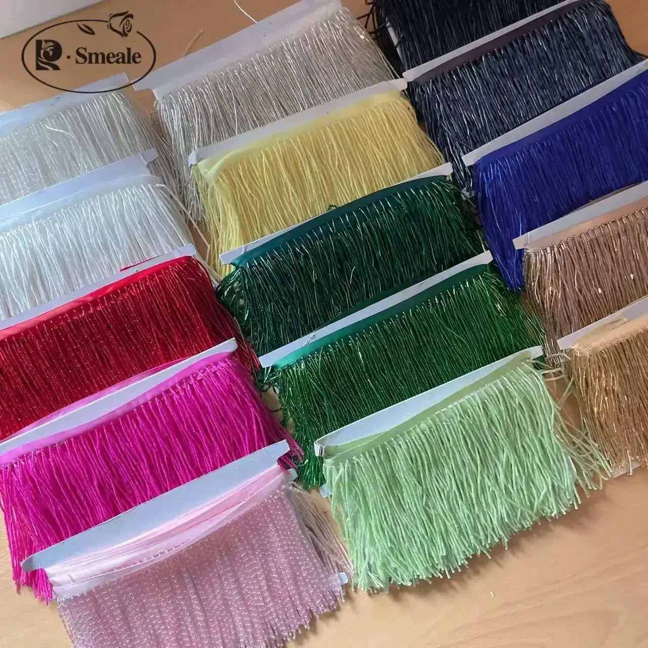 Tassel med tub pärlor på längd