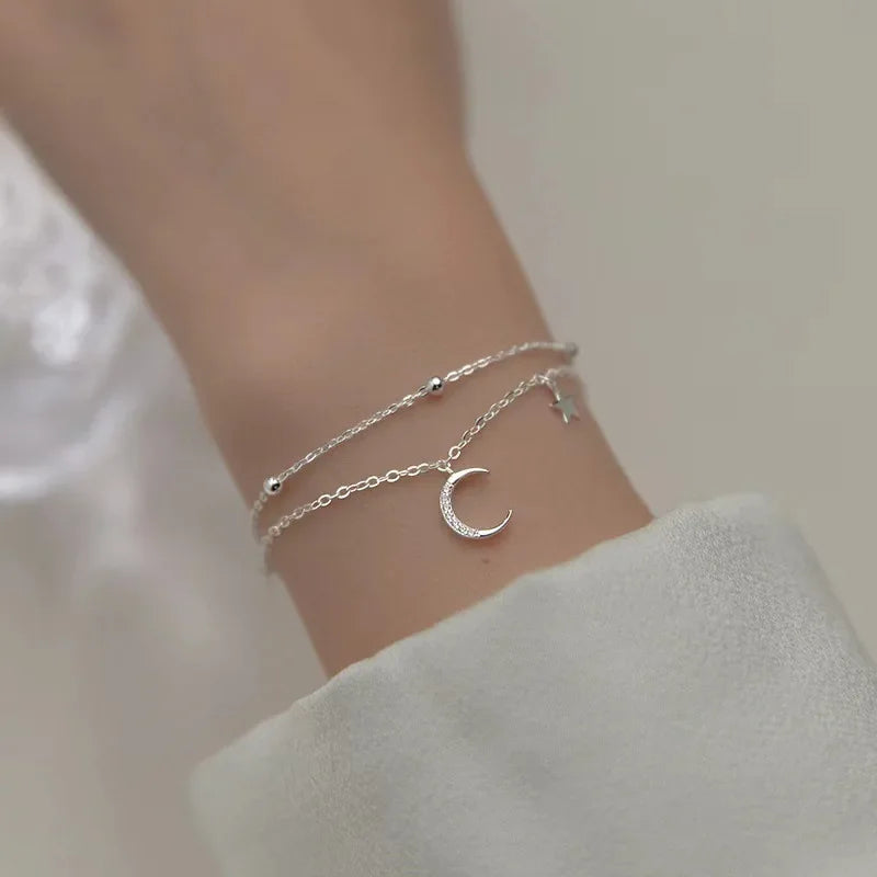Armband med måne&stjärna berlocker i äkta silver