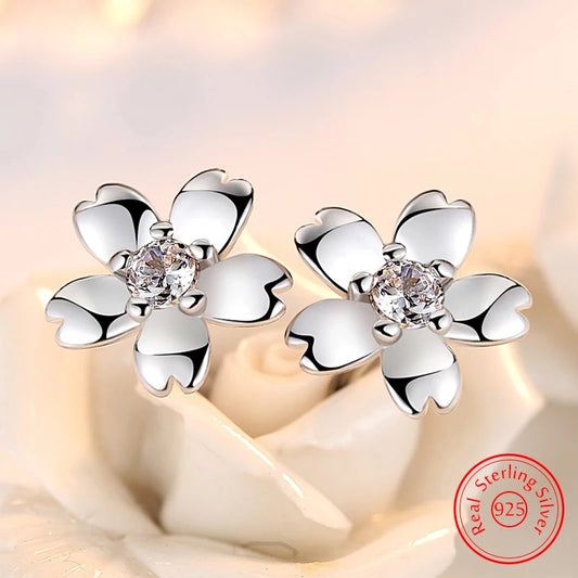 Blomformade örhängen i äkta silver