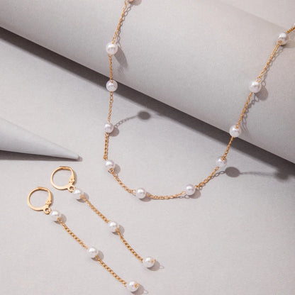 Matchande halsband och örhängen med kedja och pearls