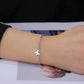 Armband med paper clip kedja och berlock