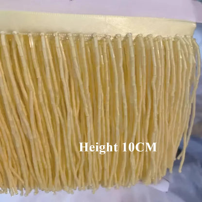 Tassel med tub pärlor på längd