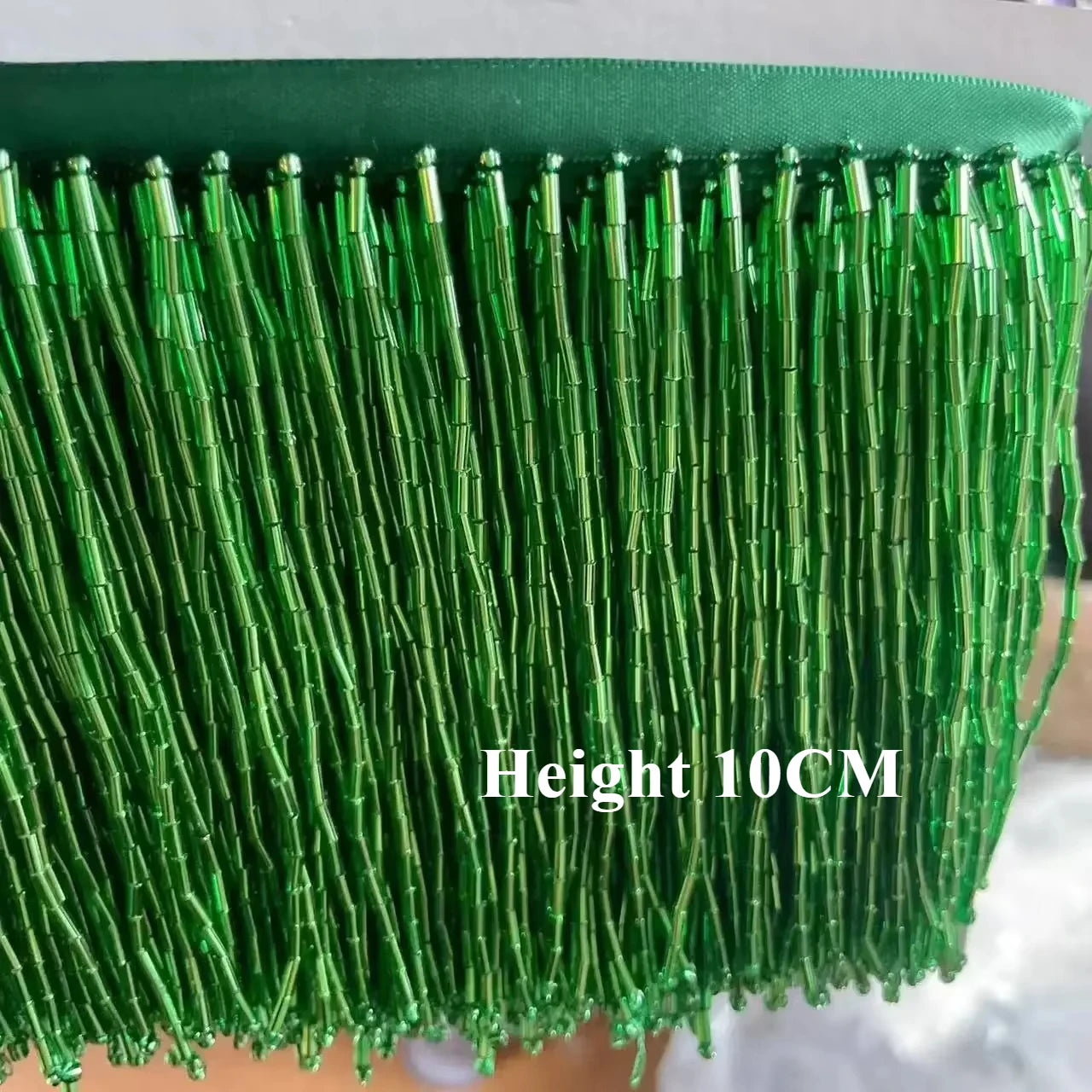 Tassel med tub pärlor på längd