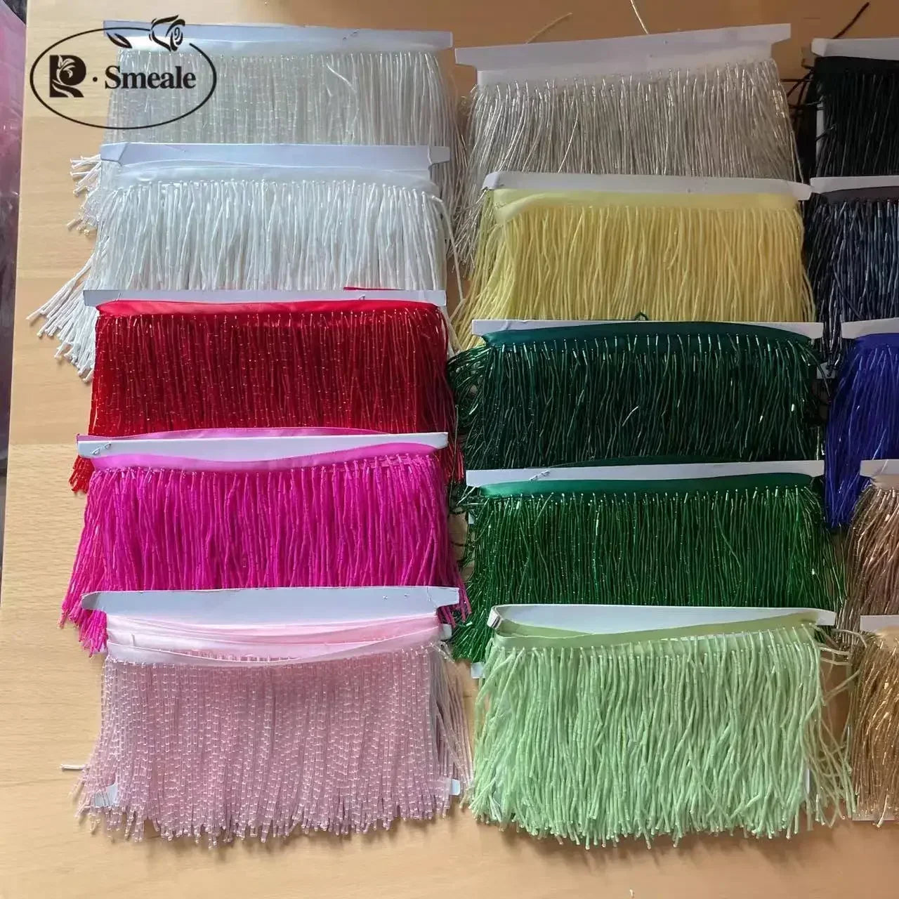 Tassel med tub pärlor på längd