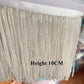 Tassel med tub pärlor på längd