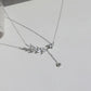 Necklace in sterling silver with leaves and rhinestones