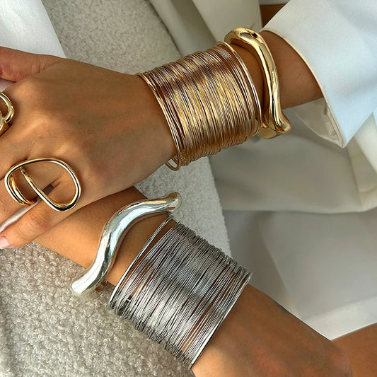 Armband  bred metall ringar
