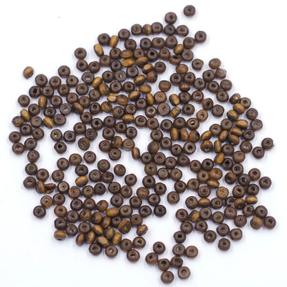 Mini trä pärlor i olika färger  4mm
