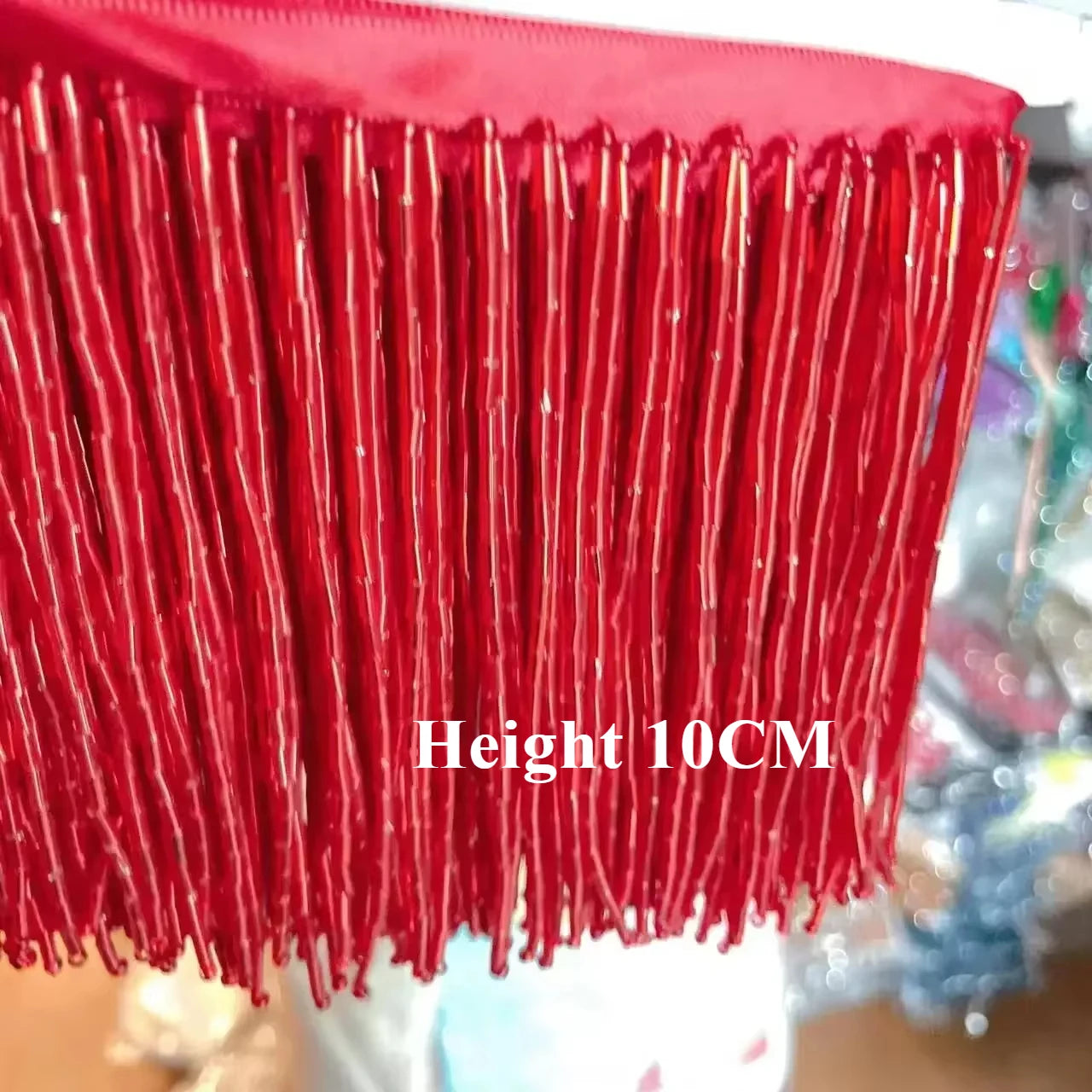 Tassel med tub pärlor på längd