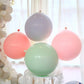 Stora pastellfärgade ballonger