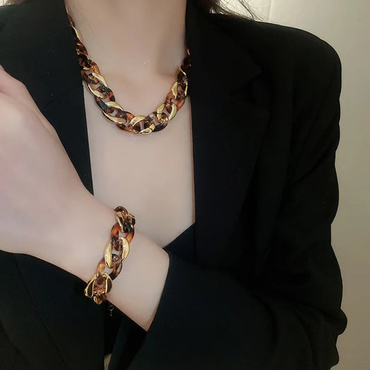 3-set med halsband armband och örhängen brunmönstrad akryl kedja